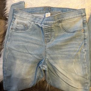 Girls Tween distressed denim legging.